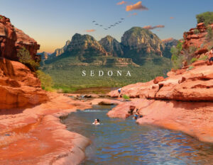Welcome to Arizona: swimmers in a red-rock creek at Slide Rock with Sedona’s buttes under a clear blue sky.