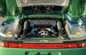 1988 Porsche 959 SC Reimagined by Canepa in Emerald Green, front three-quarter view on display.1988 Porsche 959 SC Reimagined by Canepa in Emerald Green, engine bay view on display.